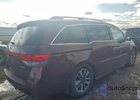 2014 Honda Odyssey Touring z USA, uszkodzony, nr VIN 5FNRL5H90EB040795